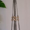 Suspension pour plantes en macramé, fil de couleur vert foncé et marron